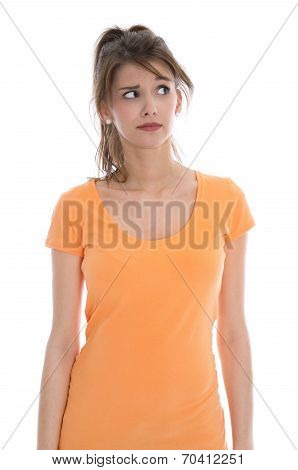Pensive And Doubtful Young Isolated Woman Wearing Summer Shirt.