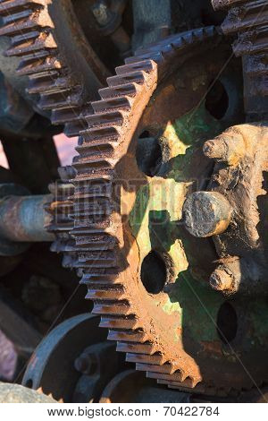 Aged Technology: Old And Rusty Gearwheel On An Old Ship - Retro And Vintage Look.