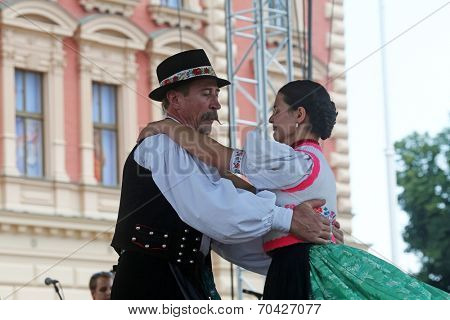 ZAGREB, CROATIA - JULY 19: Members of folk groups Nograd  from Salgotarjan, Hungary during the 48th International Folklore Festival in center of Zagreb, Croatia on July 19, 2014