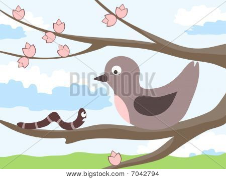 Pájaro con un gusano