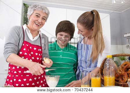 Three Generations Living Together - Happy Family Cooking Together.