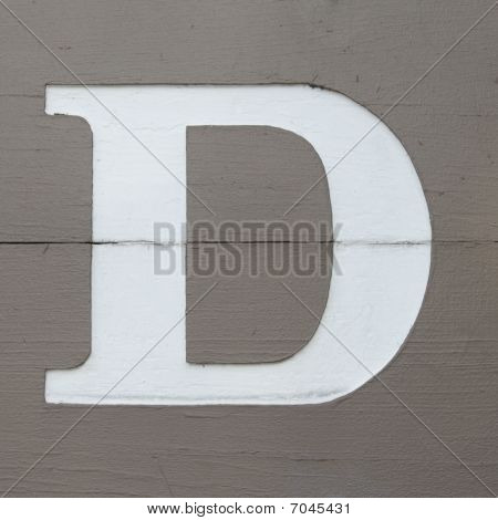 Buchstabe d auf Holzbrett