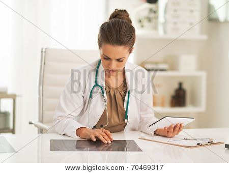 Doctor Woman Working With Fluorography In Office