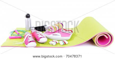 Sport requisites on a carpet isolated on white