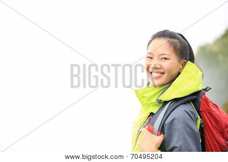 woman hiker at peak of emei mountain ,china
