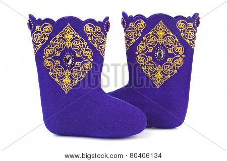 Felt boots with ornament isolated on white background