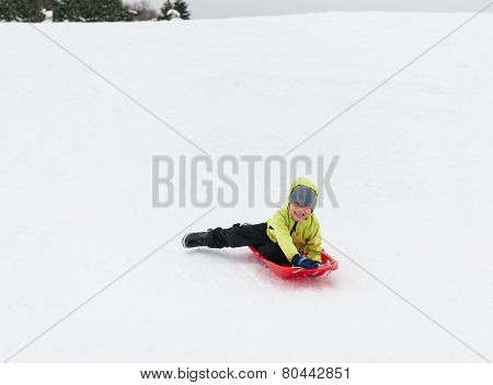 Boy On Sledge