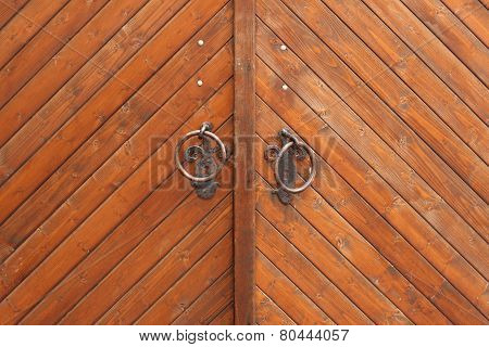 Brown planks of wooden gate texture