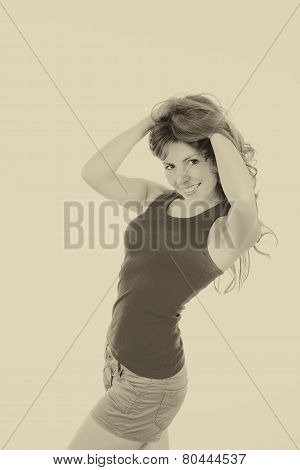 Beautiful Young Woman Wriggling Hands Through Her Hair