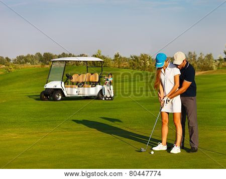 Sportive Happy Family Playing Golf