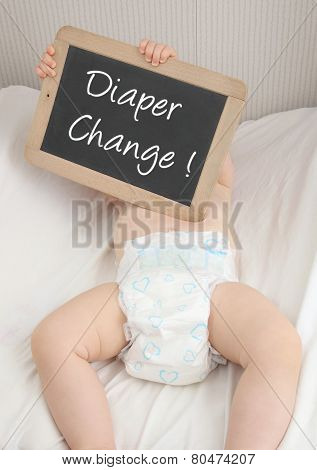 Baby With Blackboard Diaper Change