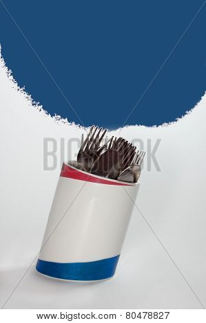 Crooked Cup, Forks And Spoons In It
