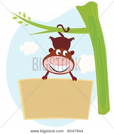 Söt apa hängande från träd upp och ner med banner