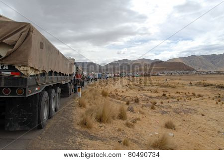 Truck Traffic Along The Road - Ayaviri, Peru