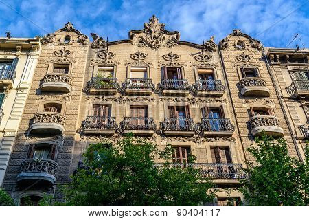 Facade of typical residential building in  Eixample district, Barcelona, Spain