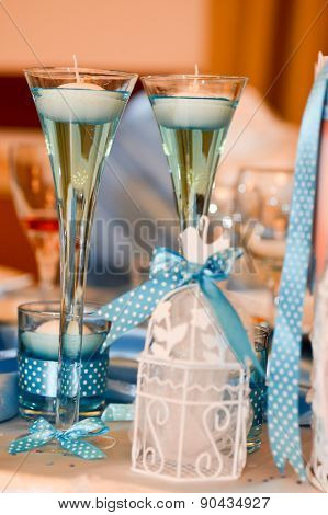 Decorative Candles With Blue Ribands