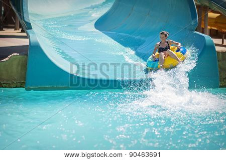 Beautiful Girl Pulls Off The Slides At Water Park