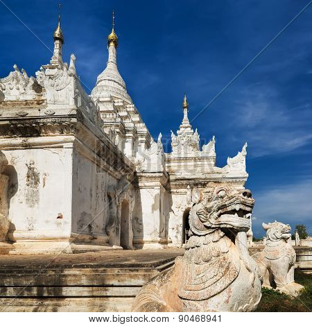 White Pagoda At Inwa City With Lions Guardian Statues. Myanmar (burma)