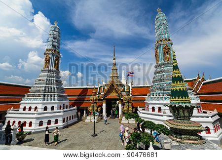 Tourists Travel To Wat Phra Kaew And Grand Palace In Bangkok, Thailand