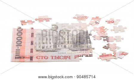 unfinished puzzle from Byelorussian roubles banknote isolated on white background
