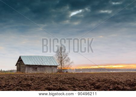 Old Barn In The Spring Sunset