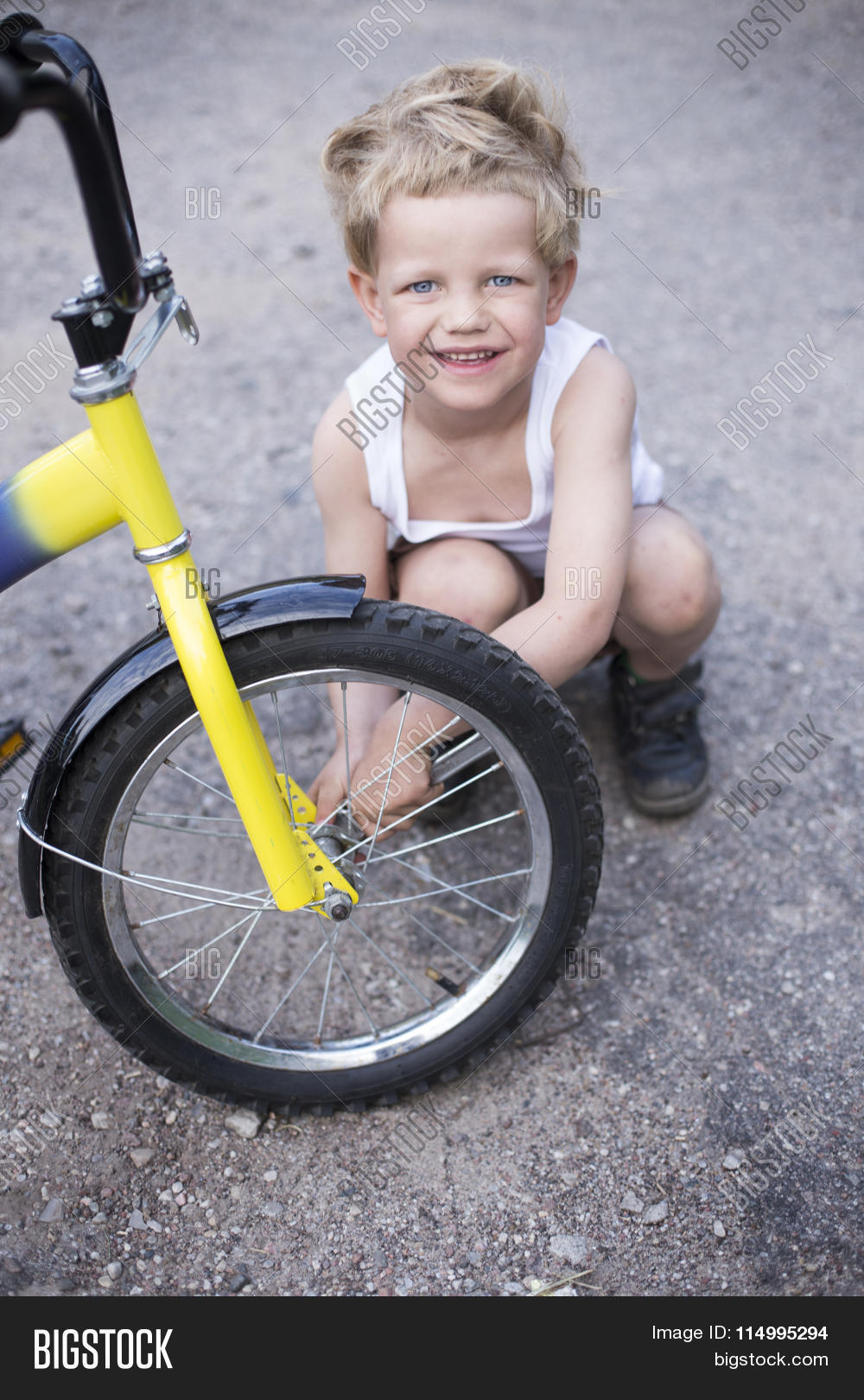 Boy Fixing Wheel Bike Image & Photo (Free Trial) Bigstock