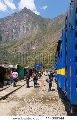 People And Baggages On Railway Track To Machu Picchu, Peru