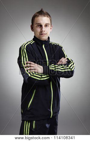 Young soccer player posing in track suit instudio for figure and portrait photos.
** Note: Soft Focus at 100%, best at smaller sizes