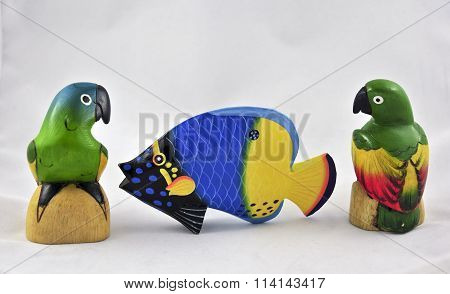 wooden tropical birds and fish