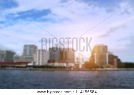 blur photo focus in city building and Jao Praya river Thailand