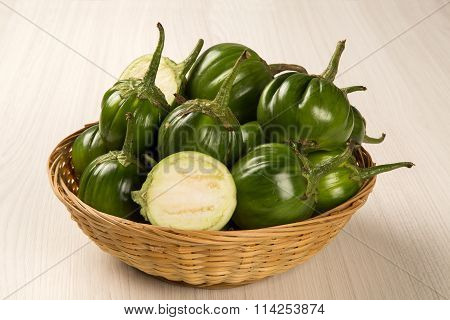 Some Green African Eggplants Over A White Background