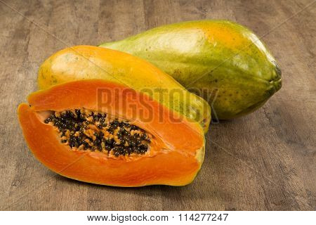 Fresh Cut Juicy Tropical Papaya Mamao Fruit With Seeds At Brazilian