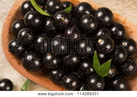 Berry Jaboticaba In Bowl On Wooden Table