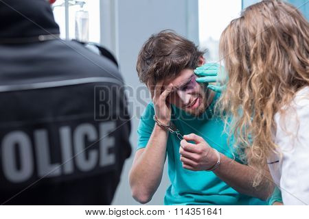 Man With Handcuffs In Hospital