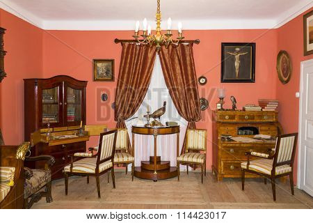 Interior of an antique wooden mansion in Tokarnia, Poland
