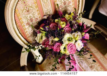 Beautiful Wedding Bouquet On A Vintage Chair