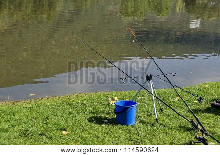 Fishing rod of stand by lake