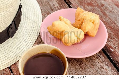 Youtiao (Chinese doughnut) and old style thai local coffee