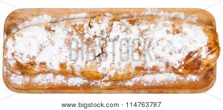 Above View Of Baked Apple Strudel On Wooden Board