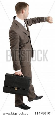 Businessman looking at his watch