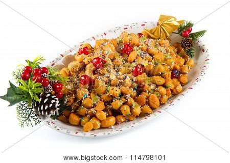 traditional italian christmas sweet struffoli on dish