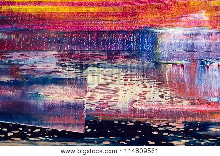 Abstract painted canvas. Oil paints on a palette.