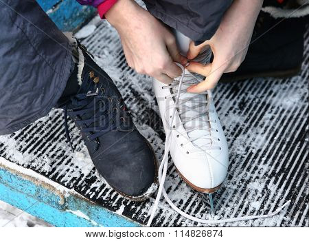 Close Up Photo Of Feet In Boot And Skate