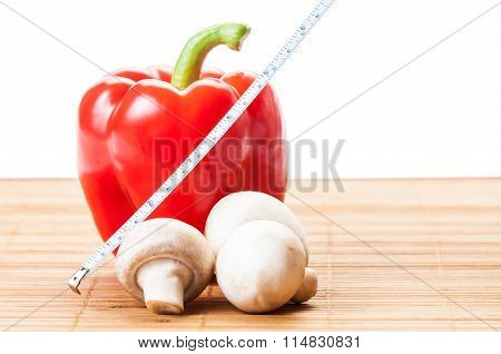Red Pepper, Champignon Mushrooms And A White Centimeter.