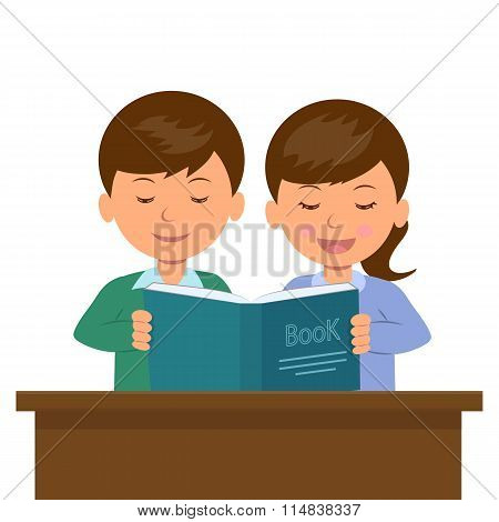 Boy and girl sitting at the desk reading a book.
