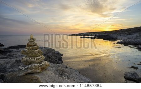Stone Pyramid At Sunset