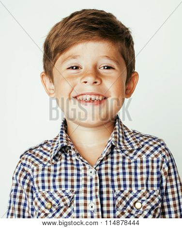little cute real boy on white background gesture smiling close up
