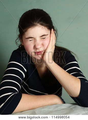 Girl With Dark Hair Have Severe Toothace