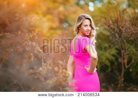 Attractive young woman enjoying her time outside in park