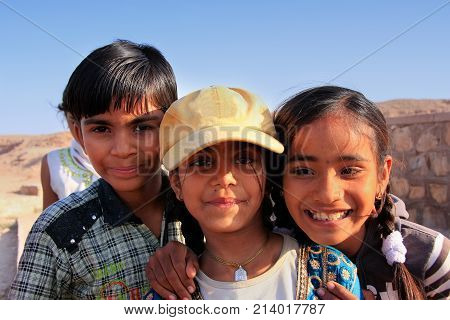Khichan, India - February 12: Unidentified Kids Play Near Water Reservoir On February 12, 2011 In Kh